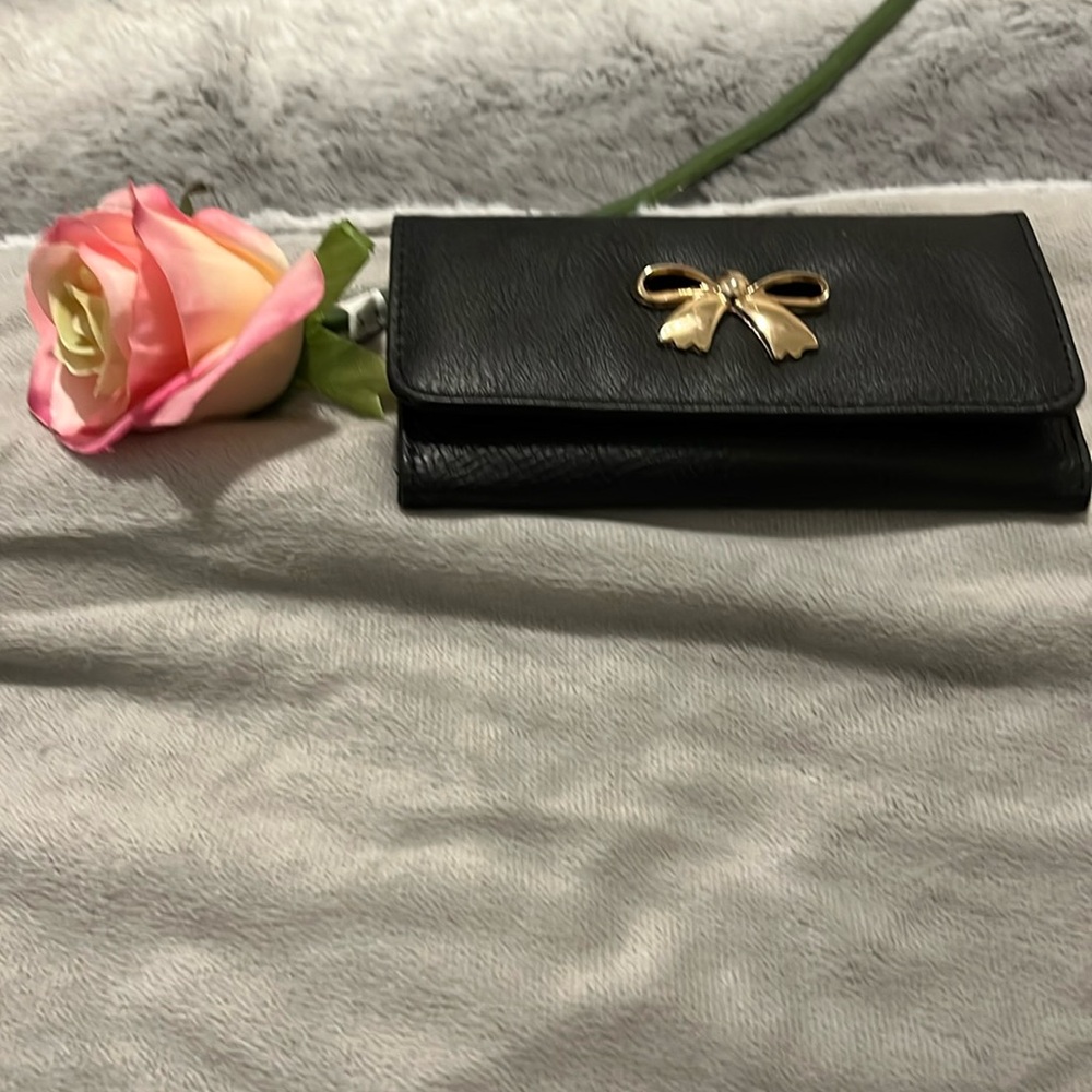 Bow tie beautiful wallet with an abundance of pockets and storage
